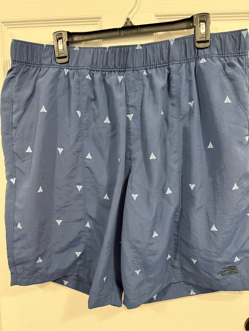 The North Face Men's Navy Blue Swim Trunks with White Sail Motif